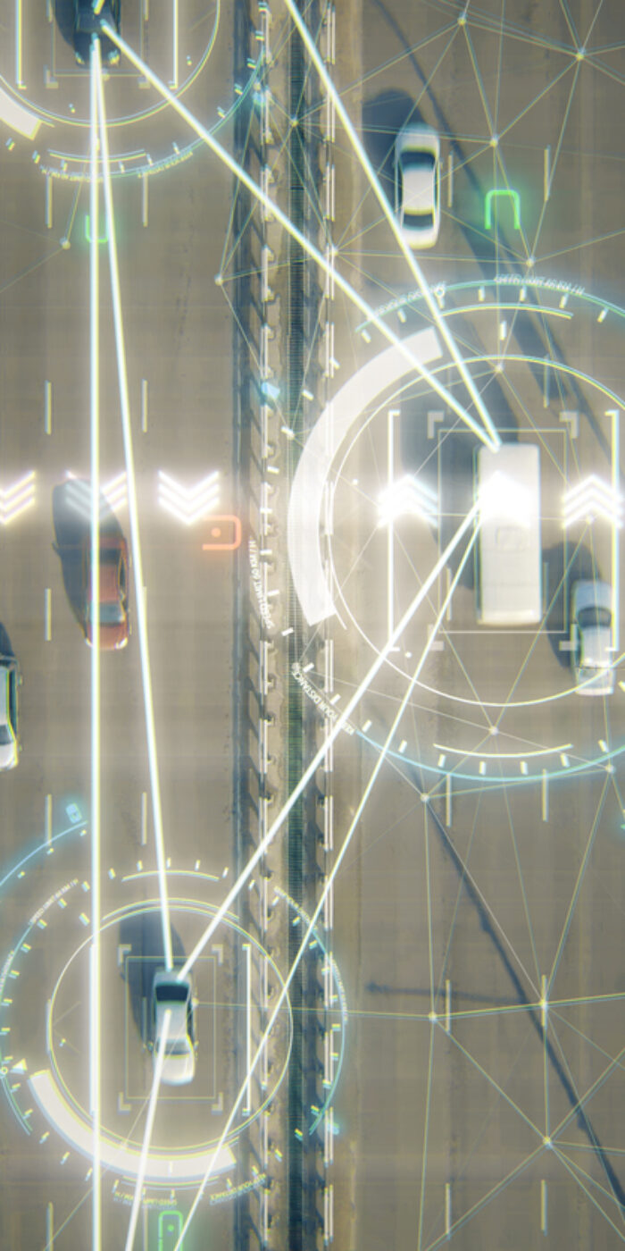 4k aerial view of driverless or autonomous car. Traffic passing by a highway. Plate number, speed limit and ID number displaying. Future transportation. Artificial intelligence. Self driving.