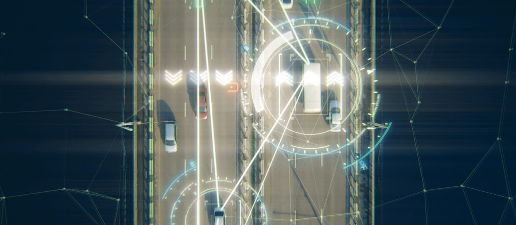 4k aerial view of driverless or autonomous car. Traffic passing by a highway. Plate number, speed limit and ID number displaying. Future transportation. Artificial intelligence. Self driving.