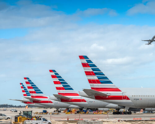 Miami, USA - November 4, 2020: America Airlines planes waiting for passengers at Miami International Airport.