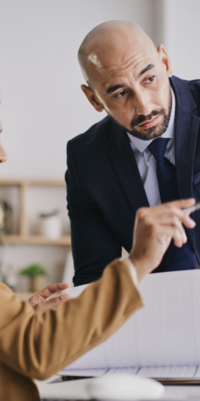 Government leaders reviewing asset management data and capital planning charts