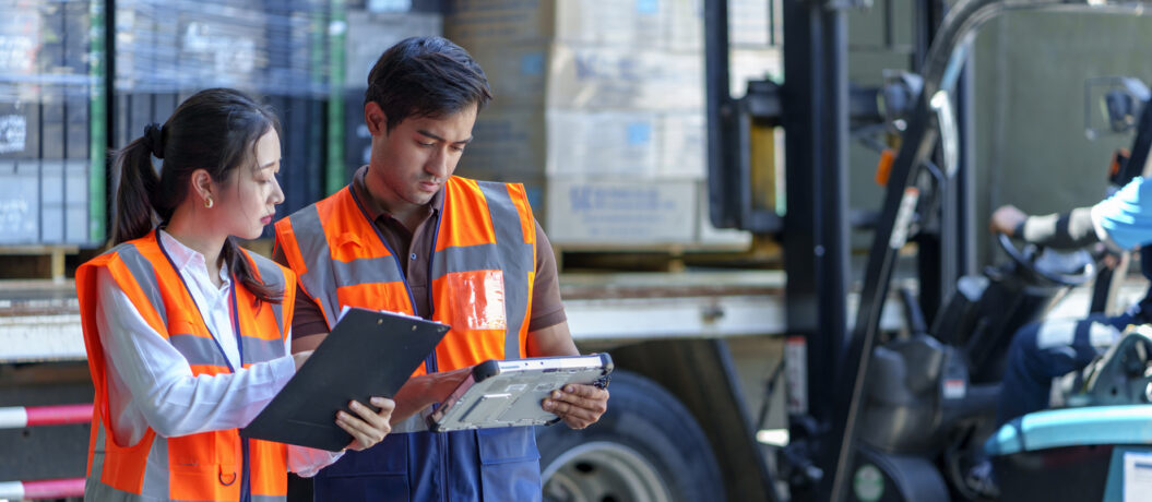 two employees completing inventory