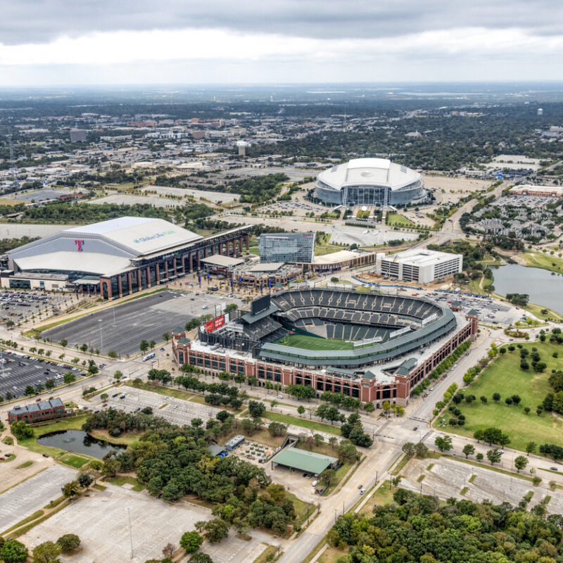 Arlington, United States - October 21, 2020: Aerial view of the three professional sports venues on adjacent properties just east of Dallas, Texas, including Globe Life Field, the former home of baseball's Texas Rangers, Globe Life Park, the new home of the Texas Rangers, and AT&T Stadium, the home of the NFL Dallas Coboys.
