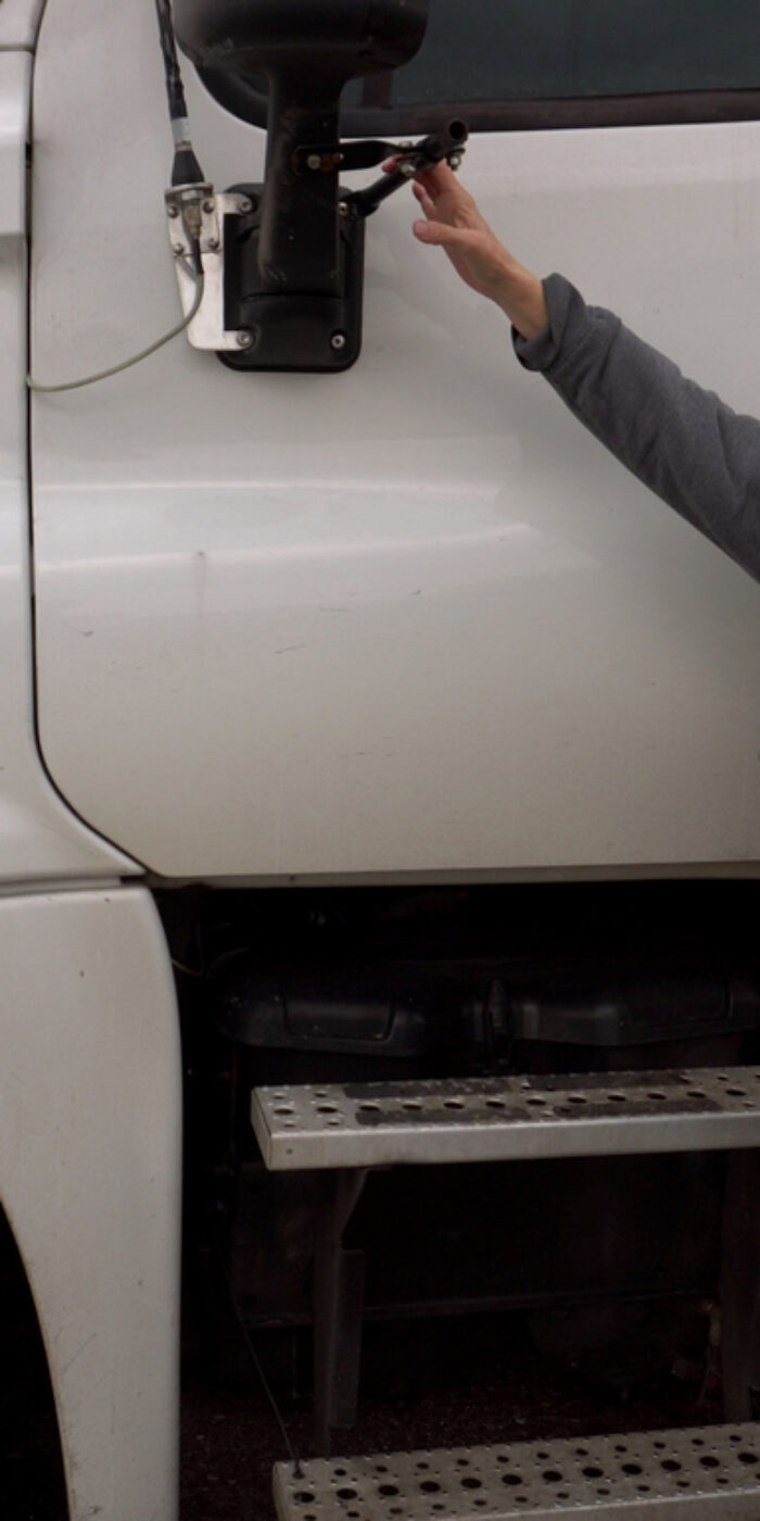A semi-truck is checked daily by the driver, who also checks the trailer for defects.