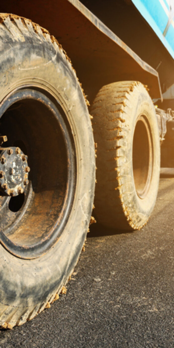 it is constructional truck on asphalt road.