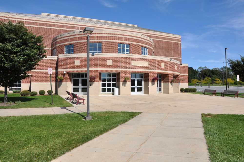 Exterior,Of,A,Modern,Rounded,Red,Brick,School,Building,By